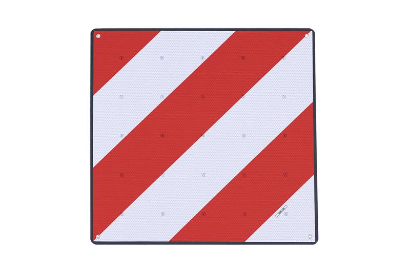 Placa V20 metálica con espuma protectora trasera (FOAM), diseñada para señalizar la carga saliente y proteger las bicicletas durante el transporte.