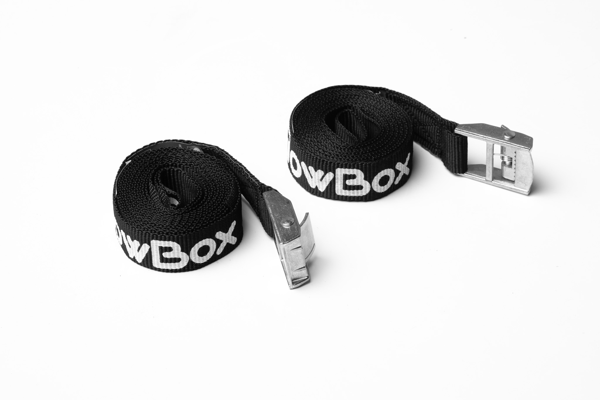 Conjunto de 2 correas para TowBox, diseñado para asegurar la carga en el interior del portaequipajes y mejorar la estabilidad durante el transporte.