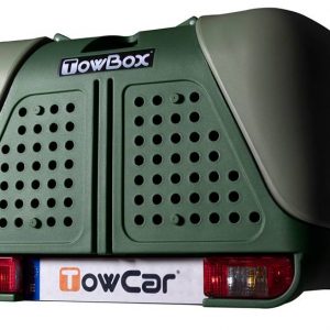 TowBox V2 color verde instalado en un vehículo, diseñado para ampliar la capacidad de carga y transportar animales de forma segura y cómoda.