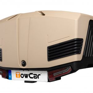 TowBox V3 color beige con base negra instalado en un vehículo, diseñado para el transporte seguro y cómodo de animales.